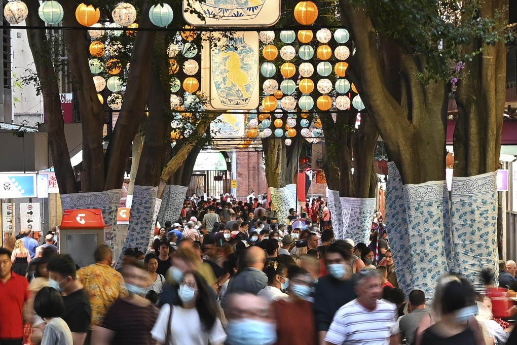 Lanterns hang from above as crowds flock to Dixon Street Mall as part of the Lunar New Year celebrations in Chinatown, Sydney, Australia, on January 29, 2022. While 54 per cent of Chinese-Australians are concerned about Chinese influence on Australia’s political processes, 62 per cent are concerned about US influence on the same. Photo: Anadolu Agency via Getty Images