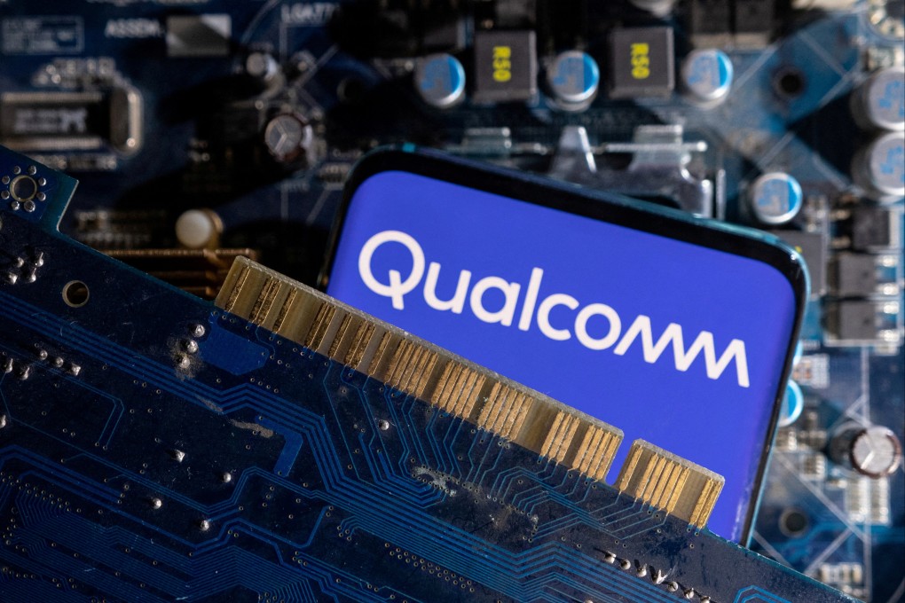 A smartphone with a displayed Qualcomm logo is placed on a computer motherboard in this illustration taken March 6, 2023. Photo: Reuters