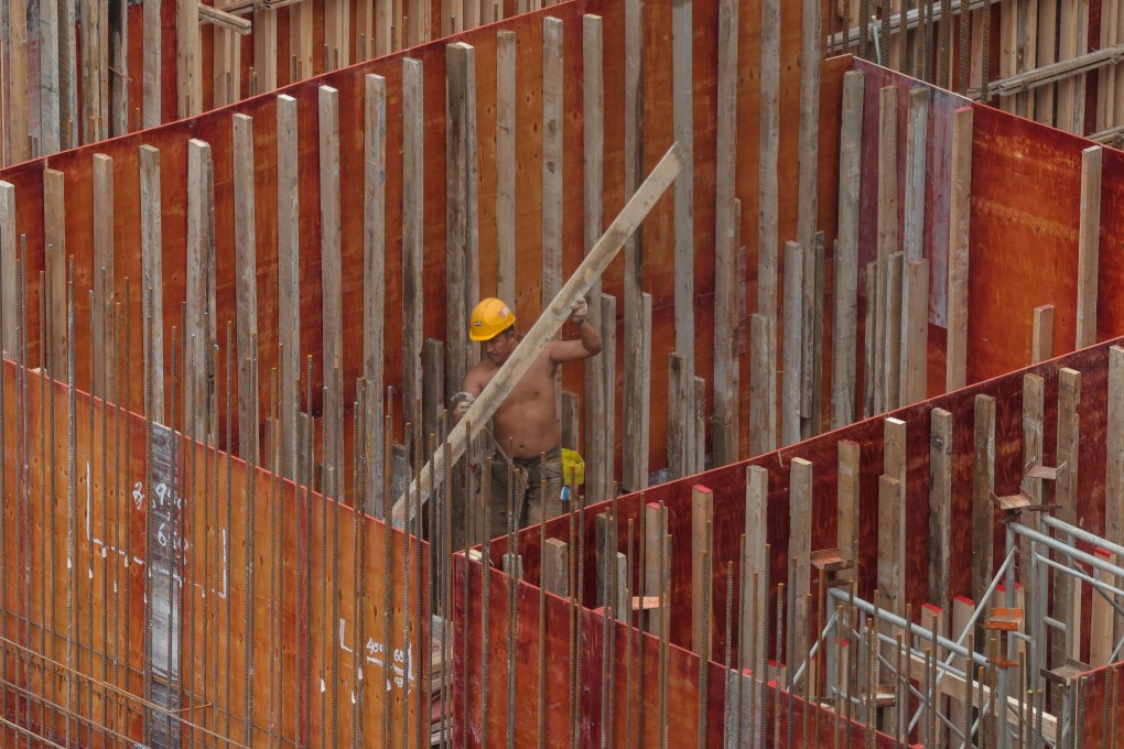 A site worker erecting formwork at a construction site in Mong Kok on April 4. Photo: Jelly Tse