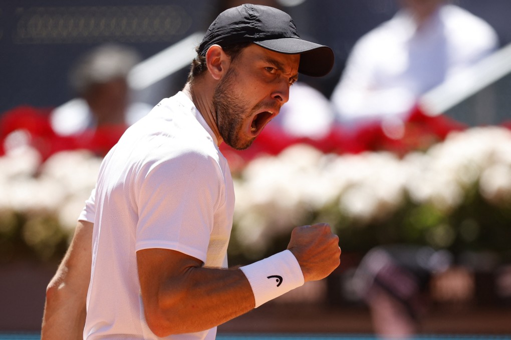 Russia’s Aslan Karatsev celebrates winning a point during his quarter-final against China’s Zhang Zhizhen. Photo: Reuters