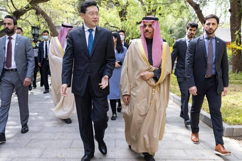 Saudi Foreign Affairs Minister Prince Faisal bin Farhan (second right) walks alongside Chinese Foreign Minister Qin Gang (second left) in Beijing on April 6. China’s role in brokering normalised relations between Saudi Arabia and Iran has bolstered its standing in the Middle East. Photo: AFP