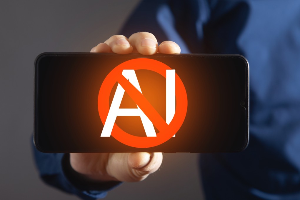 Photo illustration showing a man holding a ‘Stop AI’ symbol. Photo: Shutterstock Images