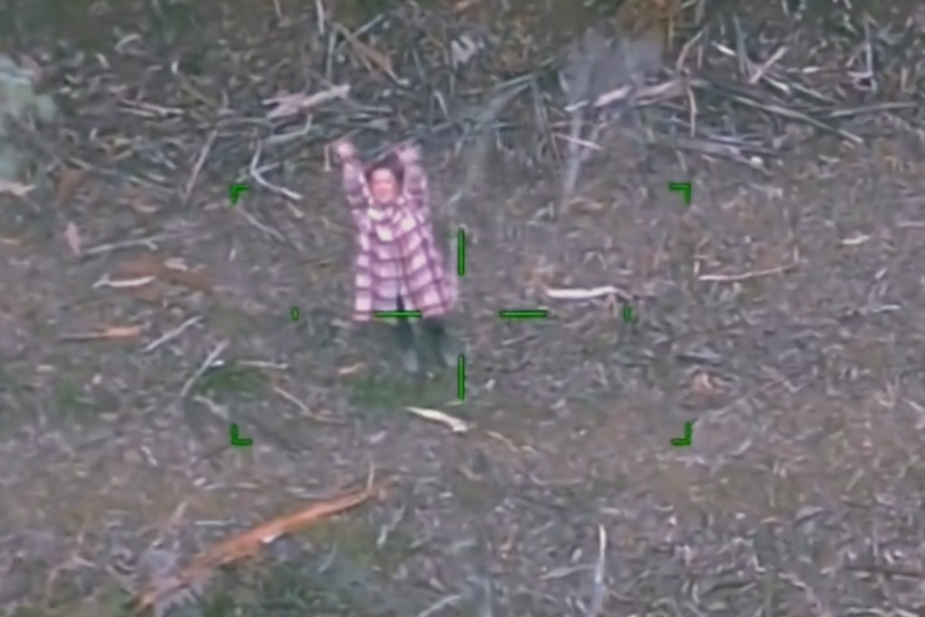 The 48-year-old woman, named only as Lillian, waves to a police helicopter to attract its attention. Photo: Twitter/@VictoriaPolice