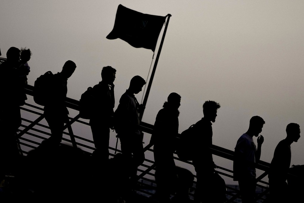 Yemeni evacuees disembark after docking at Jeddah port, Saudi Arabia. The Sudan fighting, which broke out after months of escalating tension between the country’s military and a rival paramilitary group, has so far killed at least 550 people and displaced hundreds of thousands. Photo: AP