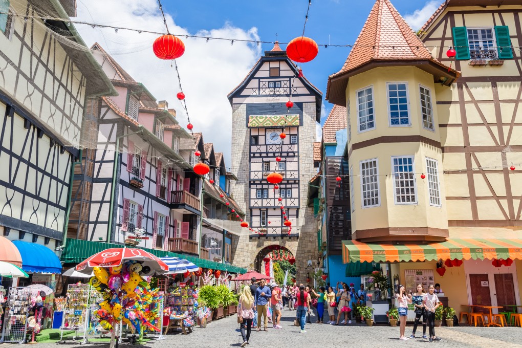 Visitors crowd the streets of Colmar Tropicale, a French-themed resort in Malaysia. Photo: Shutterstock