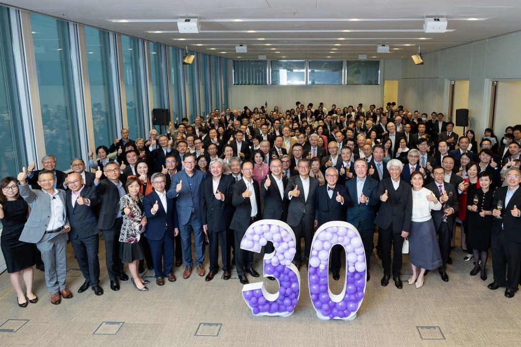 Former and current HKMA CEOs and the city’s financial secretary get together with scores of staff and key bankers to celebrate the 30th anniversary of the HKMA. Photo: Hong Kong Monetary Authority