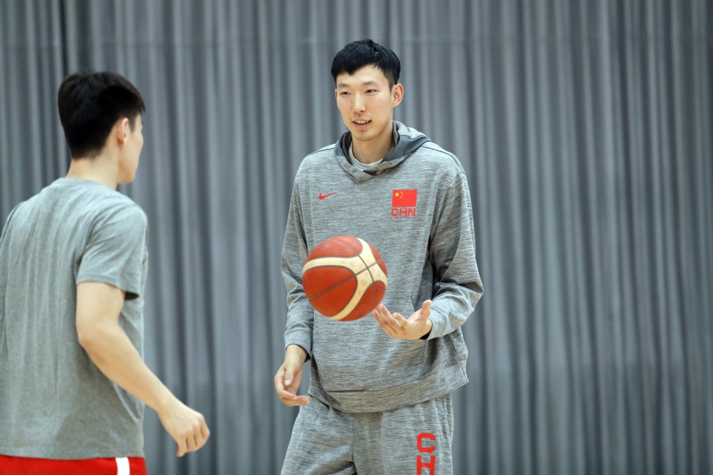 Zhou Qi (right) was at the match venue but again did not play as China beat Hong Kong Eastern. Photo: Mike Chan
