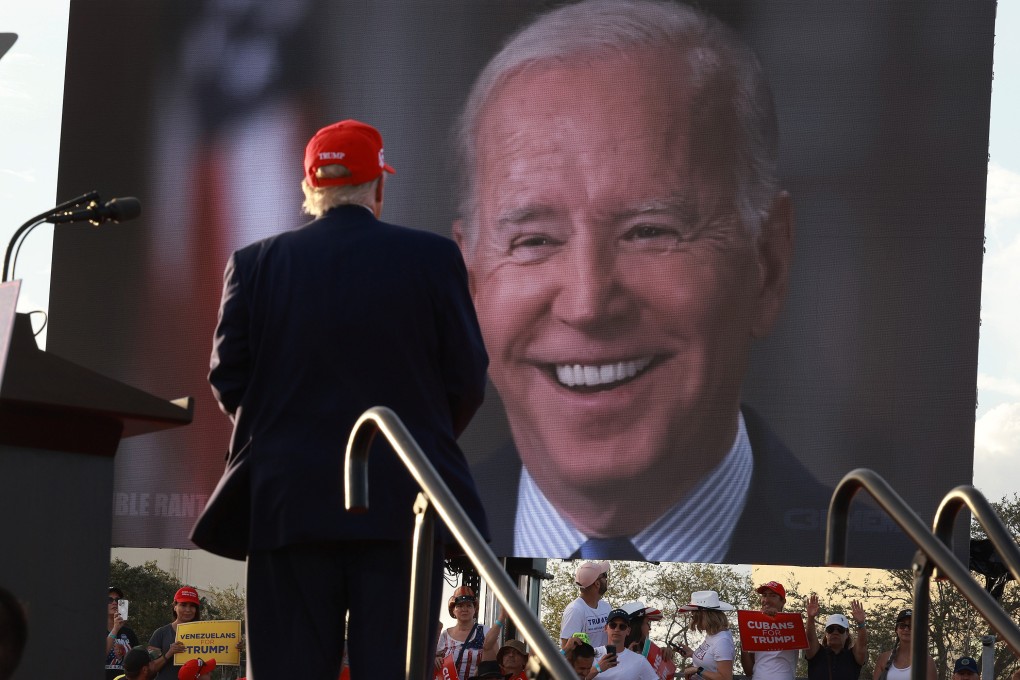 Former president Donald Trump watches a video of US President Joe Biden playing during a rally for Senator Marco Rubio at the Miami-Dade Country Fair and Exposition on November 6, 2022. Despite the wishes of many Americans, the 2024 presidential election could come down to a rematch between Biden and Trump. Photo: TNS