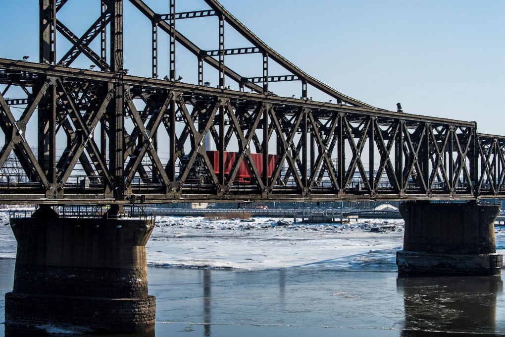 A bridge connecting the Chinese city of Dandong with the North Korean city of Sinuiju, seen here in 2018, is expected to fully reopen to trade and tourists next month. Photo: AFP