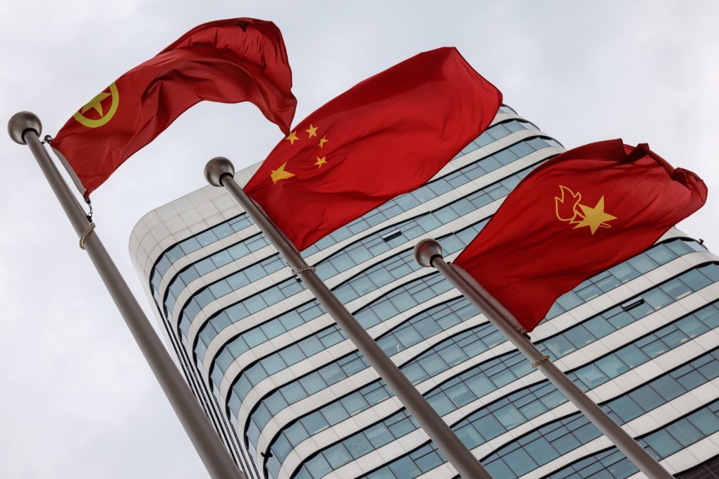 Flags stand in front of the Capvision Partners headquarters building in Shanghai, China. Photo: EPA-EFE