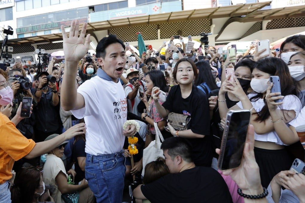 Pita Limjaroenrat (left), the Move Forward Party’s candidate for prime minister, greets supporters during a general election campaign in Bangkok, Thailand, on May 4, 2023. Photo: EPA-EFE