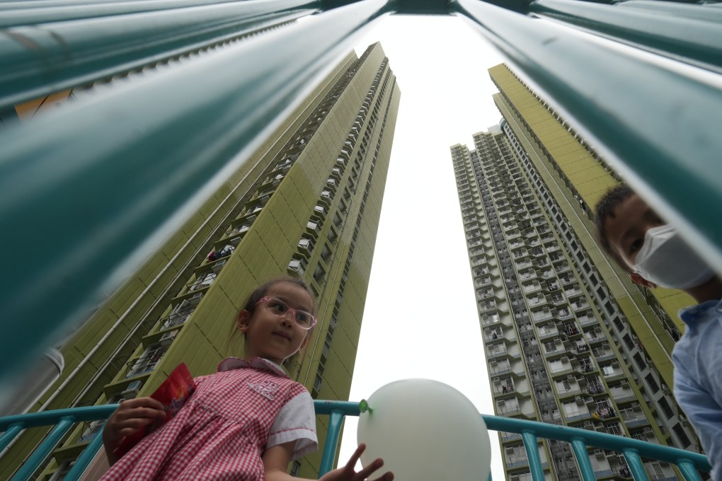 Children play at a public housing estate in Cheung Sha Wan on May 11. The increased supply of subsidised housing offers a competitive alternative to small flats in the private housing market. Photo: Sam Tsang