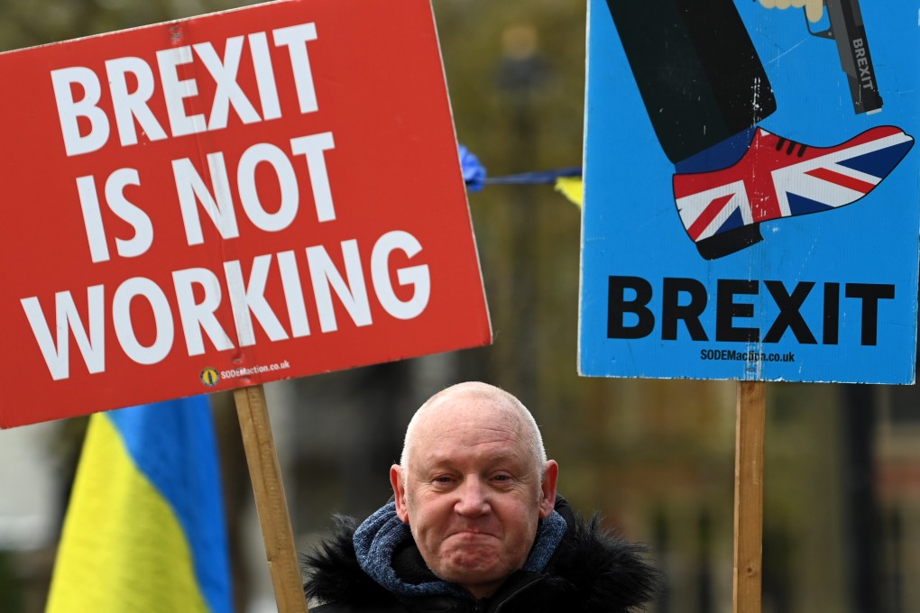 An anti-Brexit protester demonstrates outside parliament in London in February. Photo: EPA-EFE