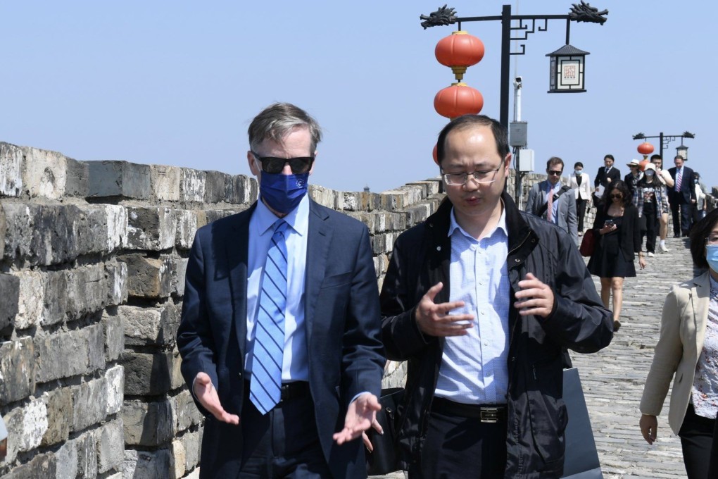 The US’ ambassador to China, Nicholas Burns, walks along Nanjing’s 600-year-old Ming Dynasty wall with Zhou Yuan, director of the wall’s Protection Management Centre Research Department. Photo: Twitter@USAmbChina