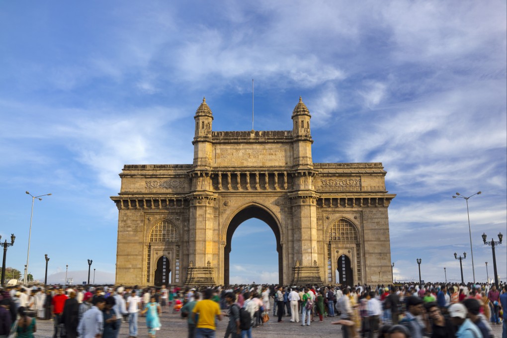 Tourists swarm the world famous Gateway of India monument in Mumbai. India is tipped by some analysts to be the next engine of growth for the hotel industry in the Asia-Pacific region. Photo: Getty Images