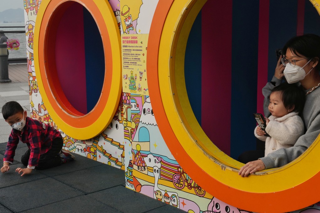 Children play along the Belcher Bay Promenade in Kennedy Town on March 14. Hong Kong’s lack of childcare and family-care options are just some of the hurdles women face in seeking to enter the workforce. Photo: Elson Li