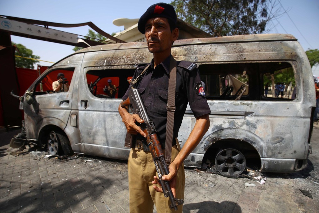 A suicide bomber attacked a bus carrying a group of Chinese nationals in Karachi last year, killing four people. Photo: EPA-EFE