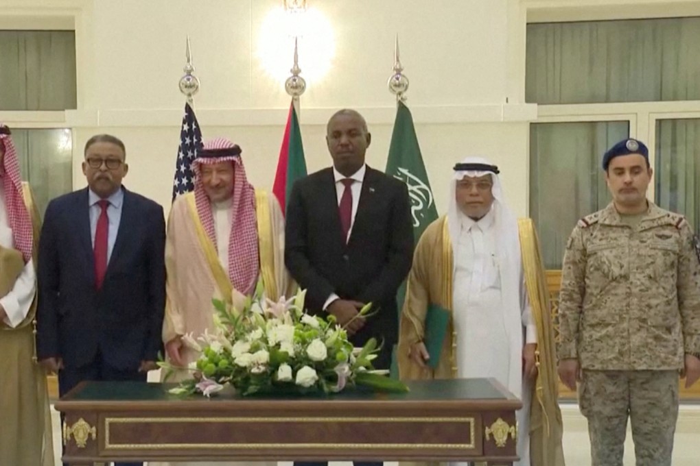 Sudan’s army and rival paramilitary RSF sign a declaration in Jeddah, Saudi Arabia that signifies their commitment to protect the civilians of Sudan but not to a ceasefire. Photo: Reuters