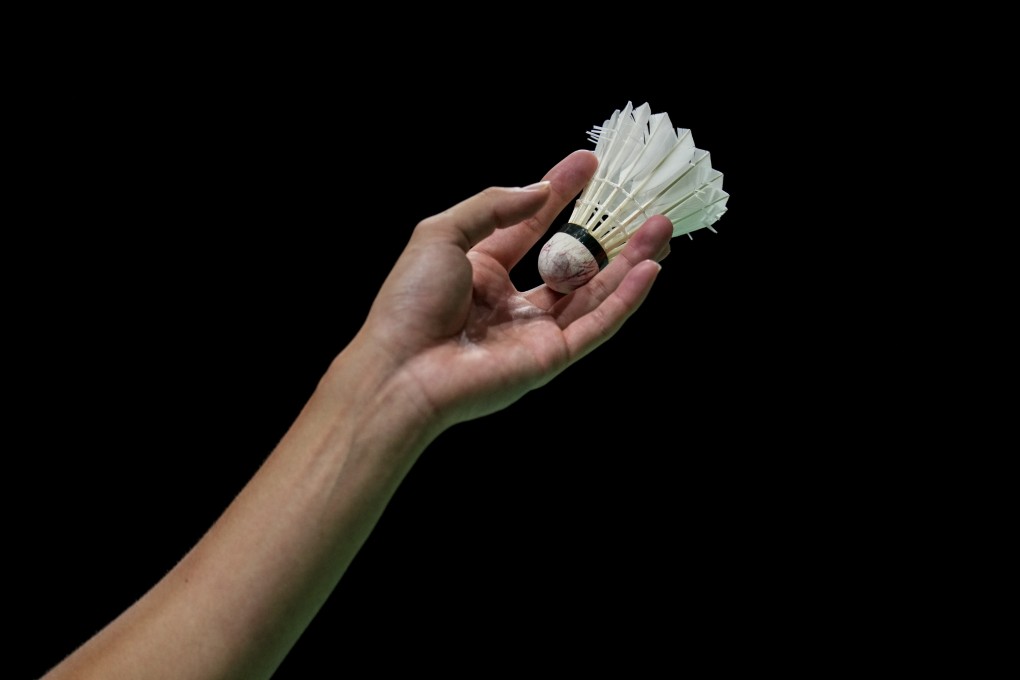 Japan’s Kanta Tsuneyama prepares to serve against Sergey Sirant during their men’s singles match at the BWF World Championships in Huelva, Spain, on December 13, 2021. Photo: AP