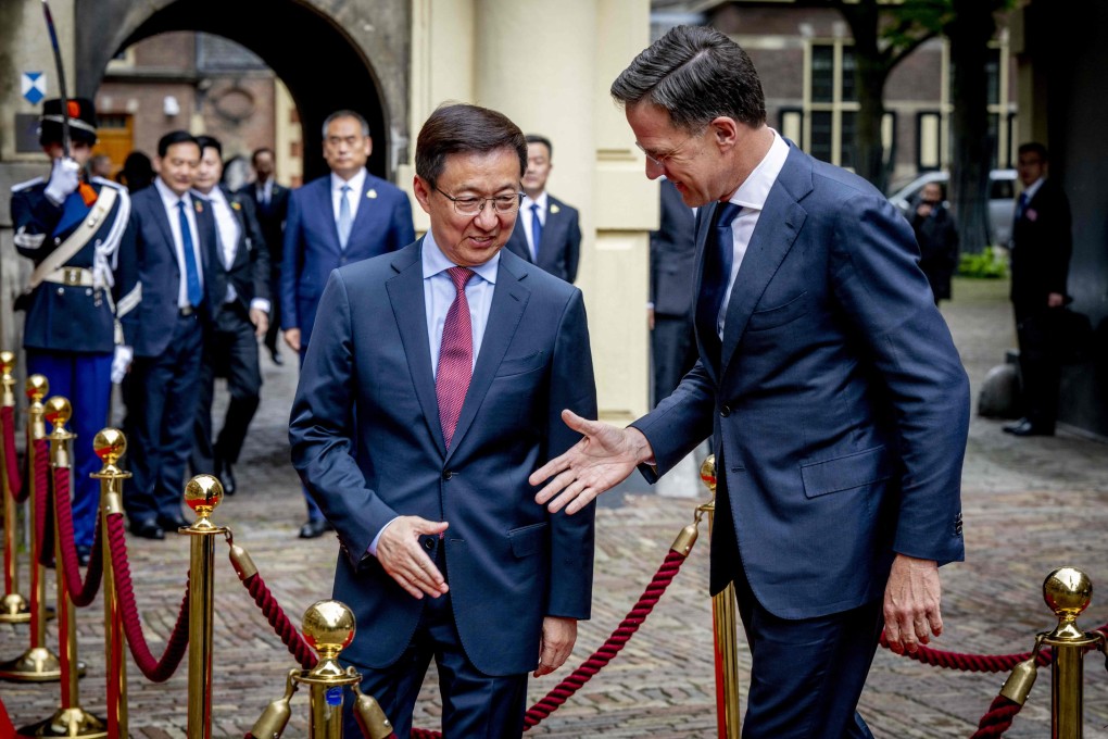 Chinese Vice-President Han Zheng is greeted by Dutch Prime Minister Mark Rutte ahead of their meeting at The Hague. Photo: AFP