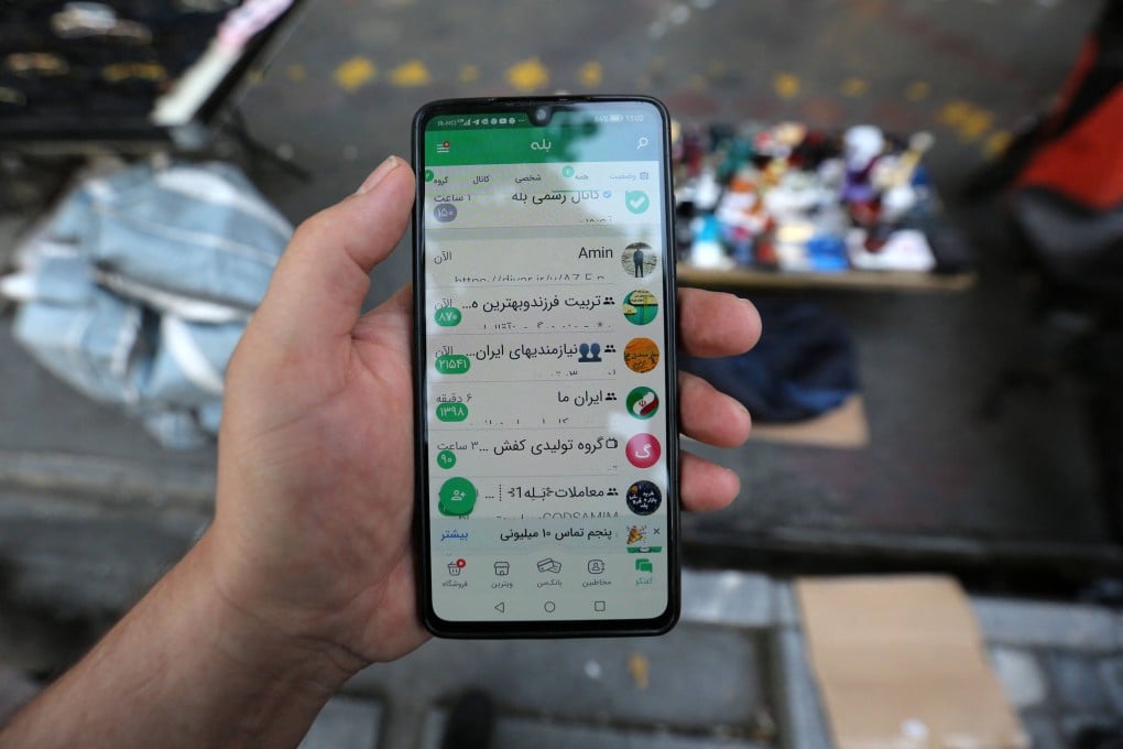 A man shows the Iranian messaging app Bale on his mobile telephone in Tehran. Photo: AFP