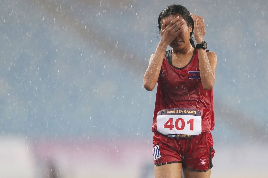 Cambodia’s Bou Samnang in tears after competing in the women’s 5000m final during the Southeast Asian Games in Phnom Penh. Photo: AFP