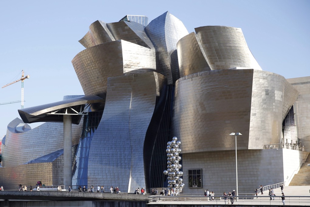 Designed by Frank Gehry, the Guggenheim Museum in Bilbao, Spain, seen in 2017, was completed below budget, within the planned six years, and attracted more visitors that it had hoped for. Photo: EPA-EFE