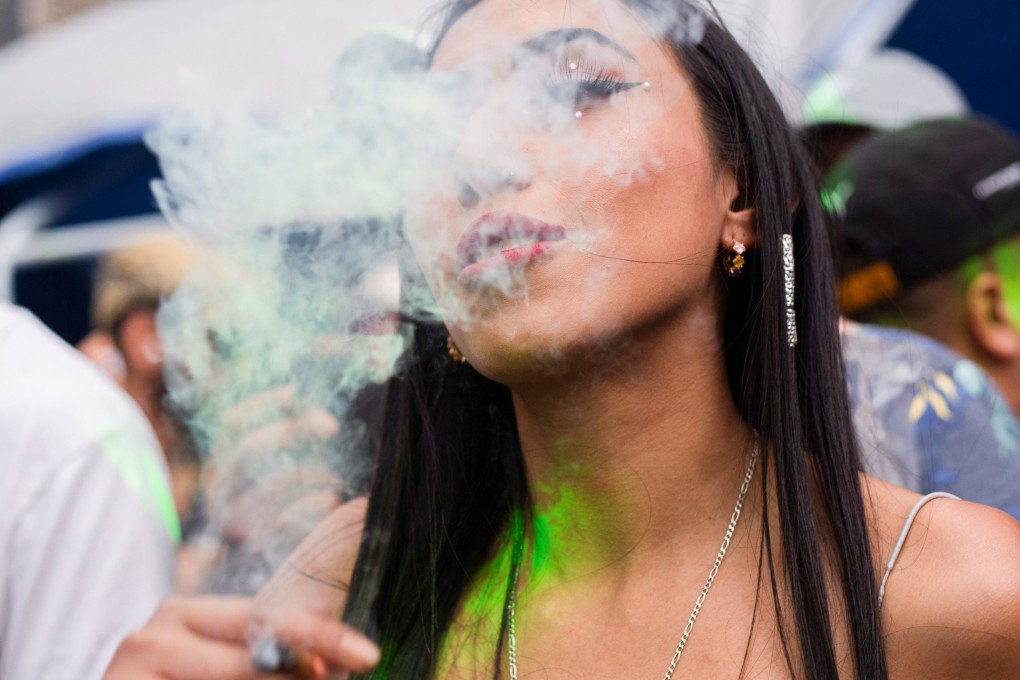 A woman smokes cannabis. Malaysia, like many of its Southeast Asian neighbours, has harsh penalties for drug crimes. Photo: Reuters