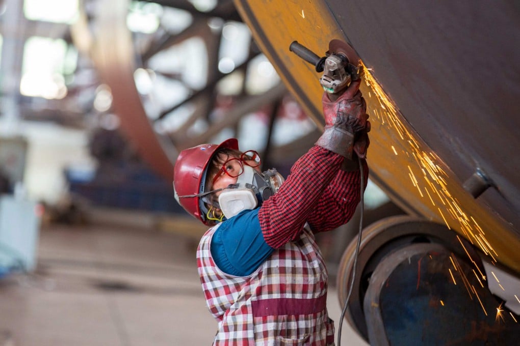 A worker at a factory in Nantong in eastern China’s Jiangsu province on May 16, 2023. Photo: AFP