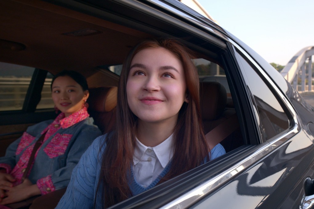 Anna Cathcart (centre) as Kitty Song Covey and Gia Kim as Yuri in a still from XO, Kitty, a new 10-episode spin-off series from the To All the Boys I’ve Loved Before movies on Netflix. Photo: Netflix