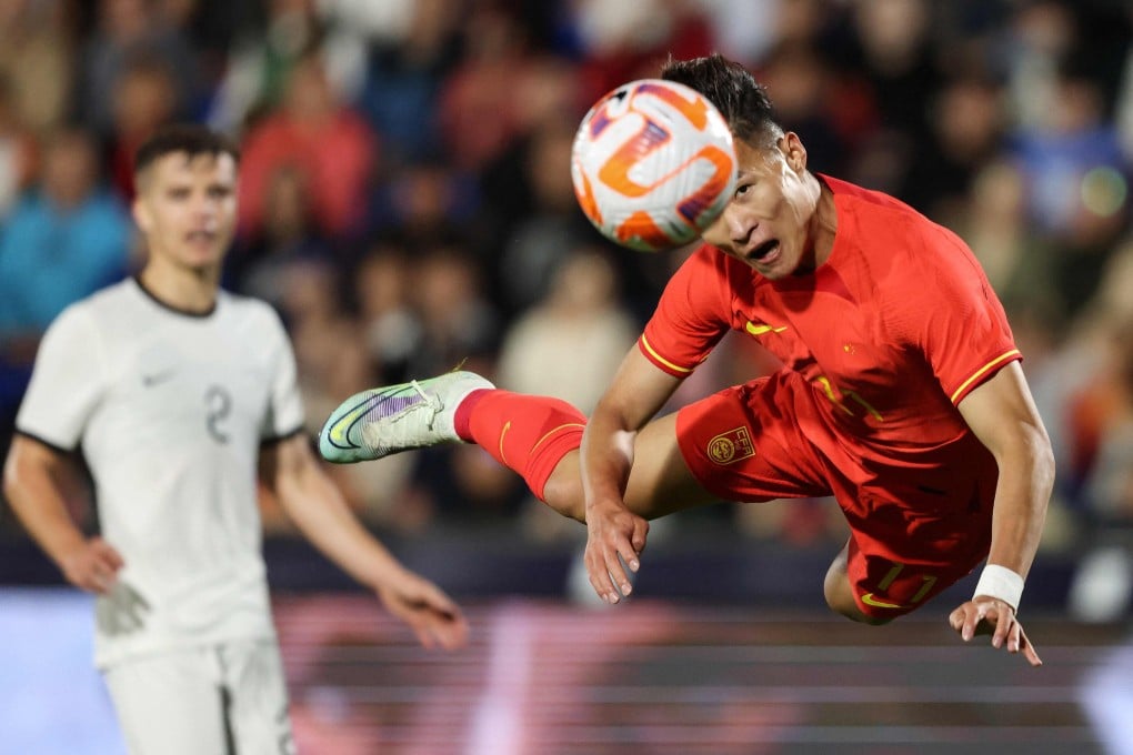 China’s Lin Liangming heads the ball during the friendly match against New Zealand at Mt Smart Stadium in Auckland on March 23, 2023. Photo: AFP