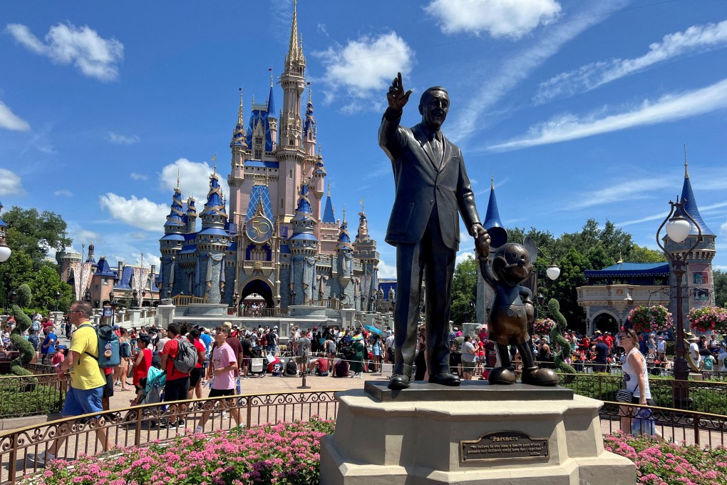 People gather at the Magic Kingdom theme park before the “Festival of Fantasy” parade at Walt Disney World in Orlando, Florida, in July 2022. Photo: Reuters