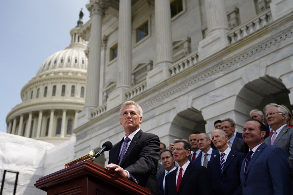 US Speaker of the House Kevin McCarthy (right) stands with Congressional Republicans during an event addressing debt ceiling negotiations with President Joe Biden outside the US Capitol in Washington on May 17. Photo: Reuters