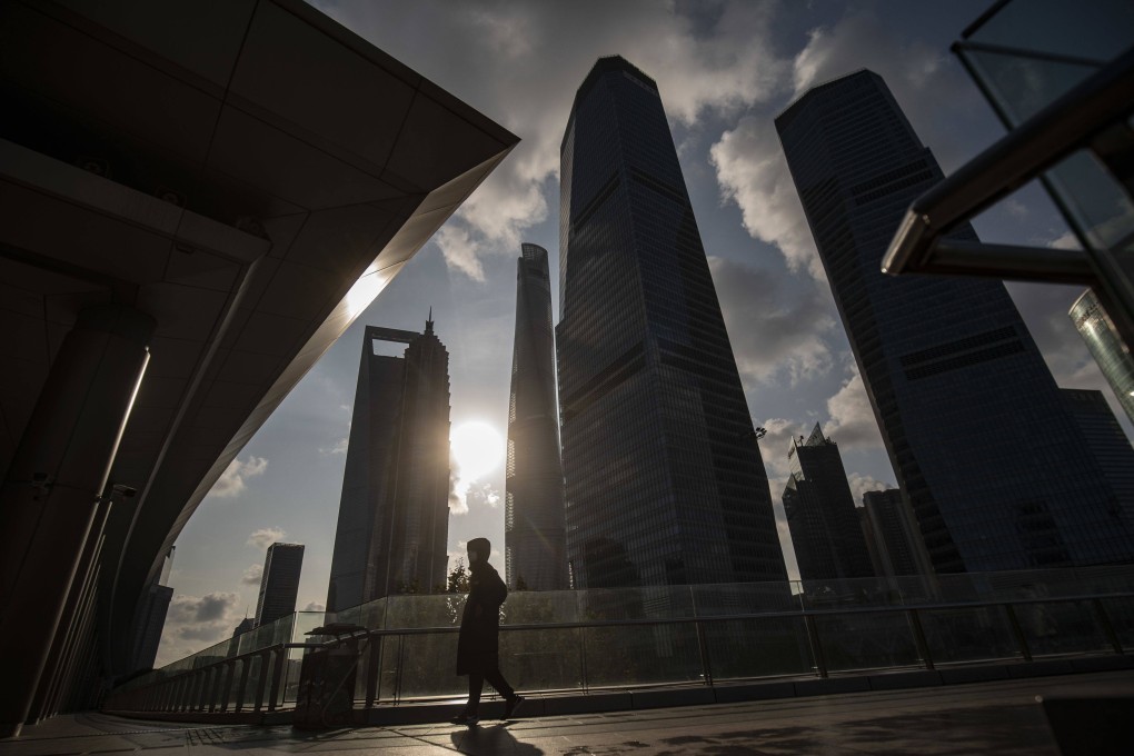 A pedestrian in Lujiazui financial fistrict in Shanghai on January 3. The unemployment rate for the 16-24 age group hit a record high of 20.4 per cent last month. Photo: Bloomberg