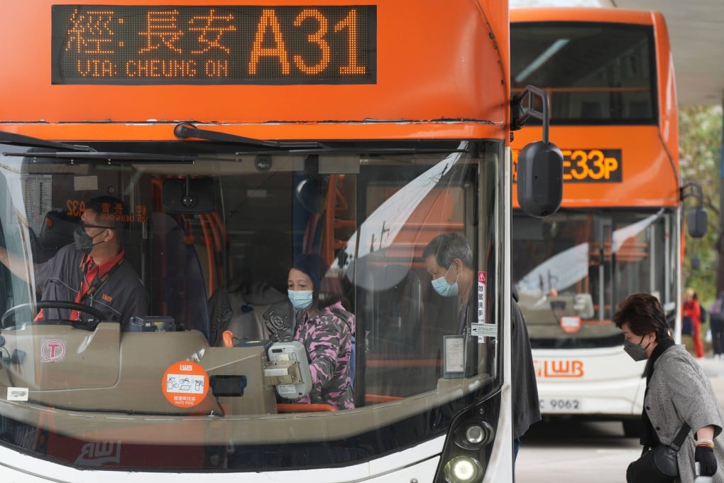 Travellers board a bus at Hong Kong International Airport on March 14. The previous administration’s decision to lower the qualifying age for senior concessionary fares to 60, from 65, has compounded the problem. Photo: Sam Tsang