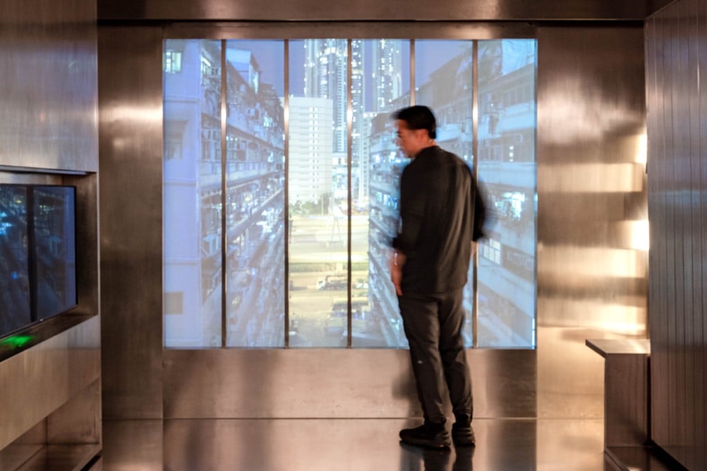 Architect Gary Chang, of Edge Design Institute, at the Domestic Transformer installation at Hong Kong’s M+ museum. On display until June 11, its fate is uncertain. Photo: Eugene Chan