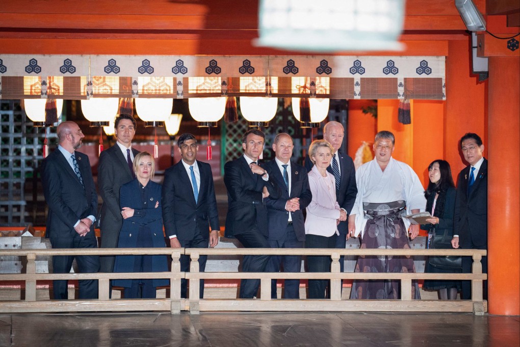 G7 leaders are given a tour of the Itsukushima Shrine during a visit to Miyajima Island as part of a summit in Hiroshima, Japan. Photo: AFP