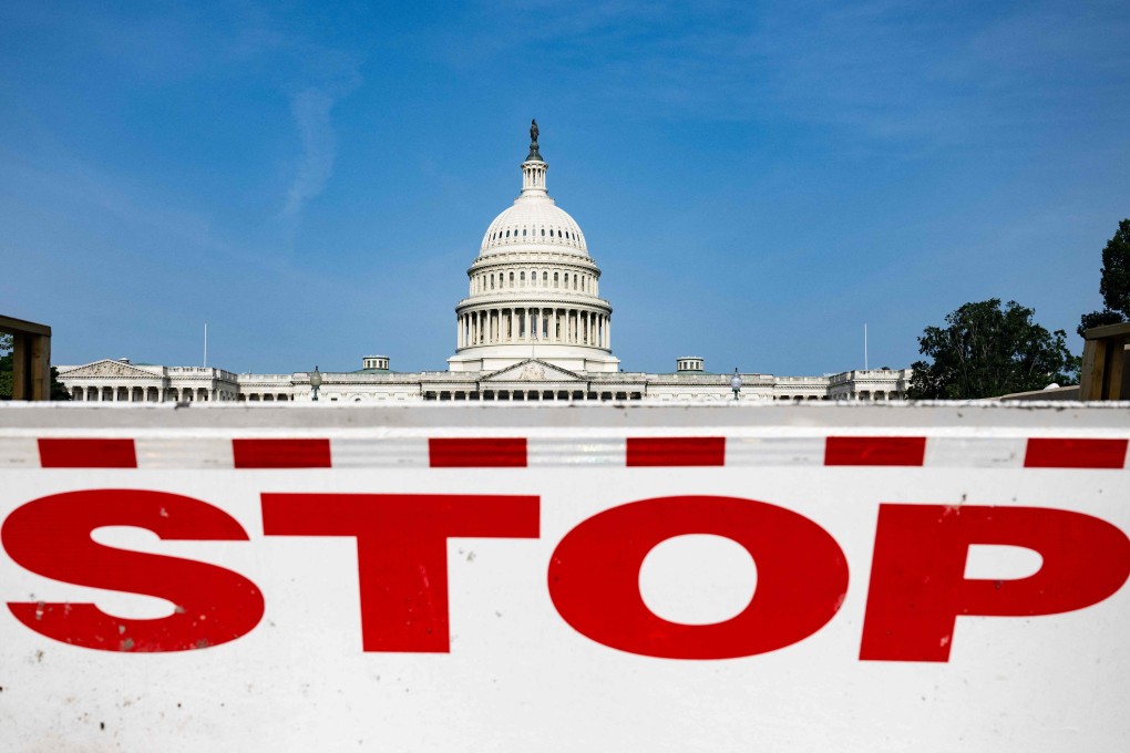 A barrier to stop vehicles stands in front of the US Capitol in Washington on May 11. Unless the US Congress votes to raise or suspend the debt ceiling, the country risks defaulting on its US$31.4 trillion debt. Photo: AFP