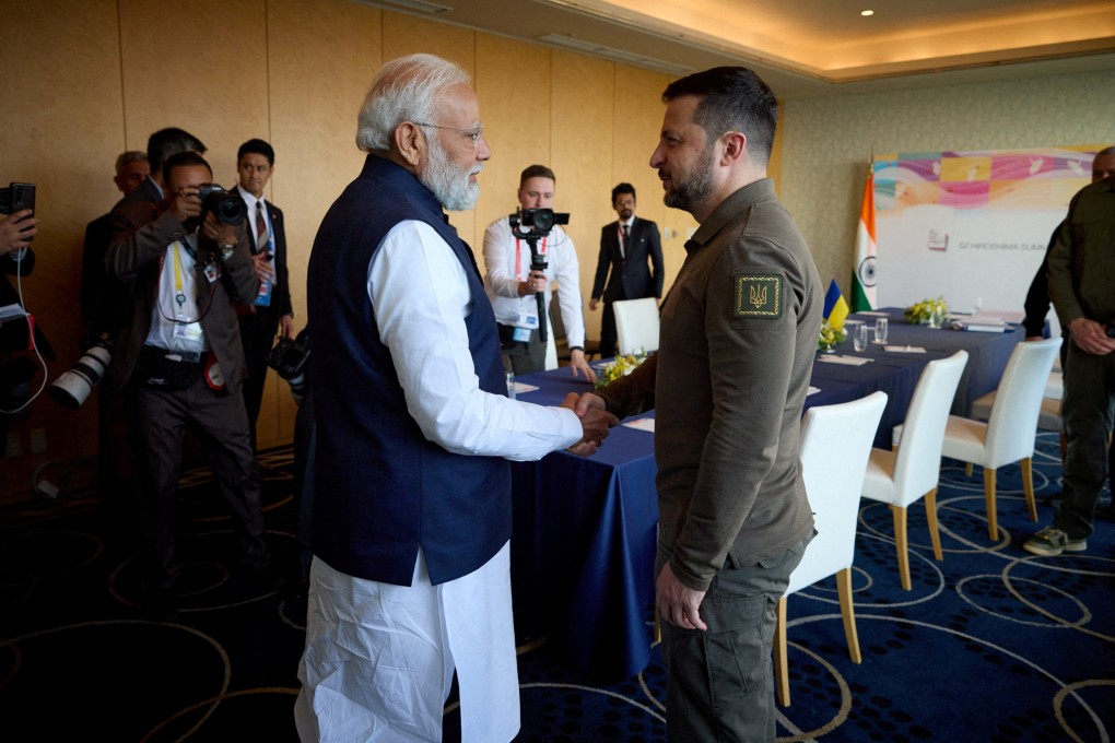 Ukraine’s President Volodymyr Zelensky and Indian Prime Minister Narendra Modi shake hands during the G7 leaders’ summit in Hiroshima, Japan. Photo: Reuters