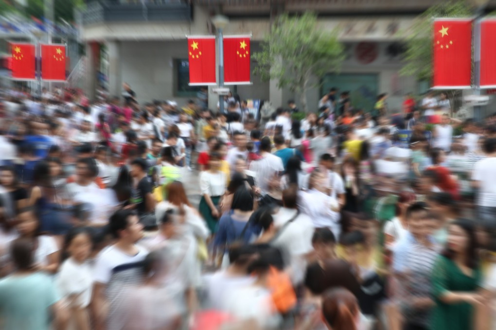 Pedestrians and office workers in Shenzhen, China. A discussion has been sparked at the highest levels by the country’s first national population decline in six decades. Photo: Shutterstock