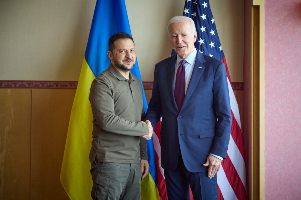 Ukraine President Volodymyr Zelensky and US President Joe Biden shake hands during the G7 leaders’ summit in Hiroshima, Japan. Photo: Reuters