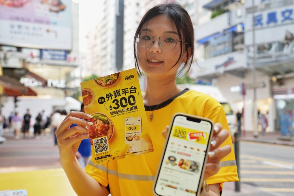 KeeTa staff hit the streets in Mong Kok to promote the new food delivery service. Photo: Elson Li