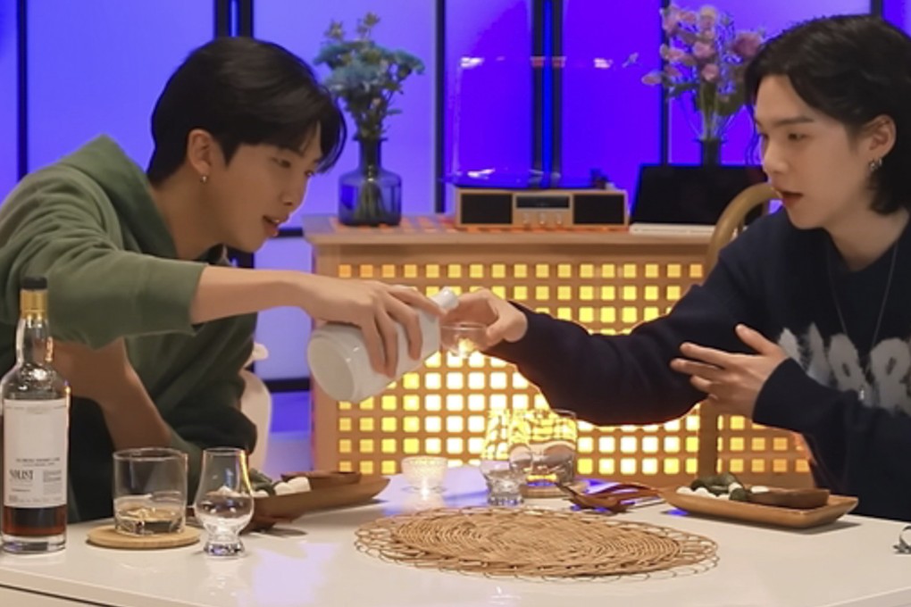 RM and Suga from BTS drink on the latter’s “Suchwita” talk show. K-pop stars appear “more relatable” when consuming alcohol on YouTube, but critics are pointing out the dangers of this new celebrity craze. Photo: Youtube / @Suchwita