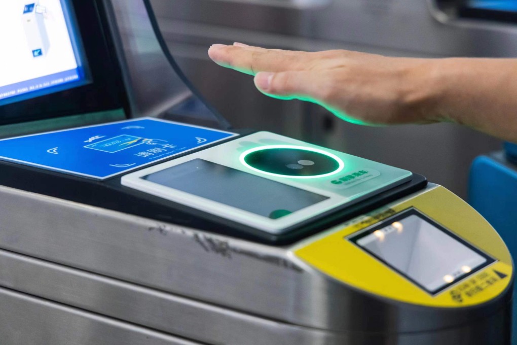 Tencent’s new palm-recognition service for WeChat Pay allows users to pay at designated metro turnstiles operating on Beijing’s airport express line by placing their hands over a scanner. Photo: Handout