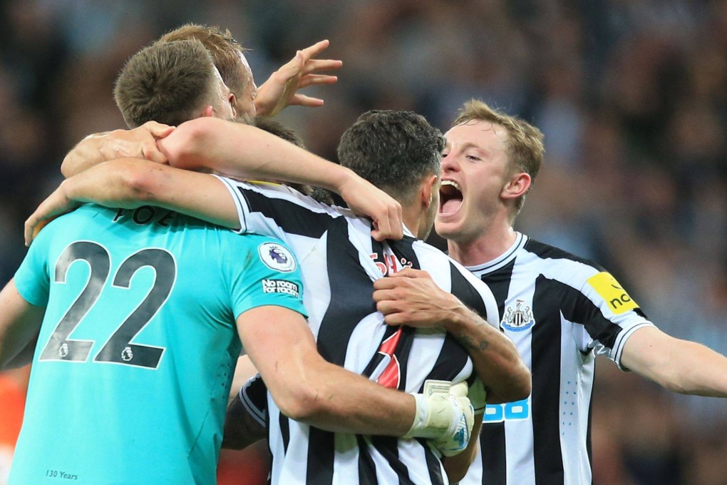 Newcastle United players celebrate after their draw with Leicester secured a top-four finish. Photo: AFP