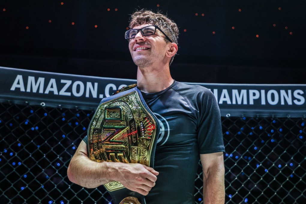 Mikey Musumeci celebrates with his flyweight submission grappling title. Photos: ONE Championship