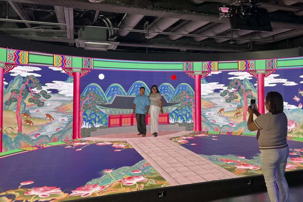K-Pop Ground has five studios, with backdrops seen in BTS and Aespa music videos, that allow visitors to choose their music,  shoot their own video, and save the whole thing on a USB stick, free of charge. Photo: Erika Na