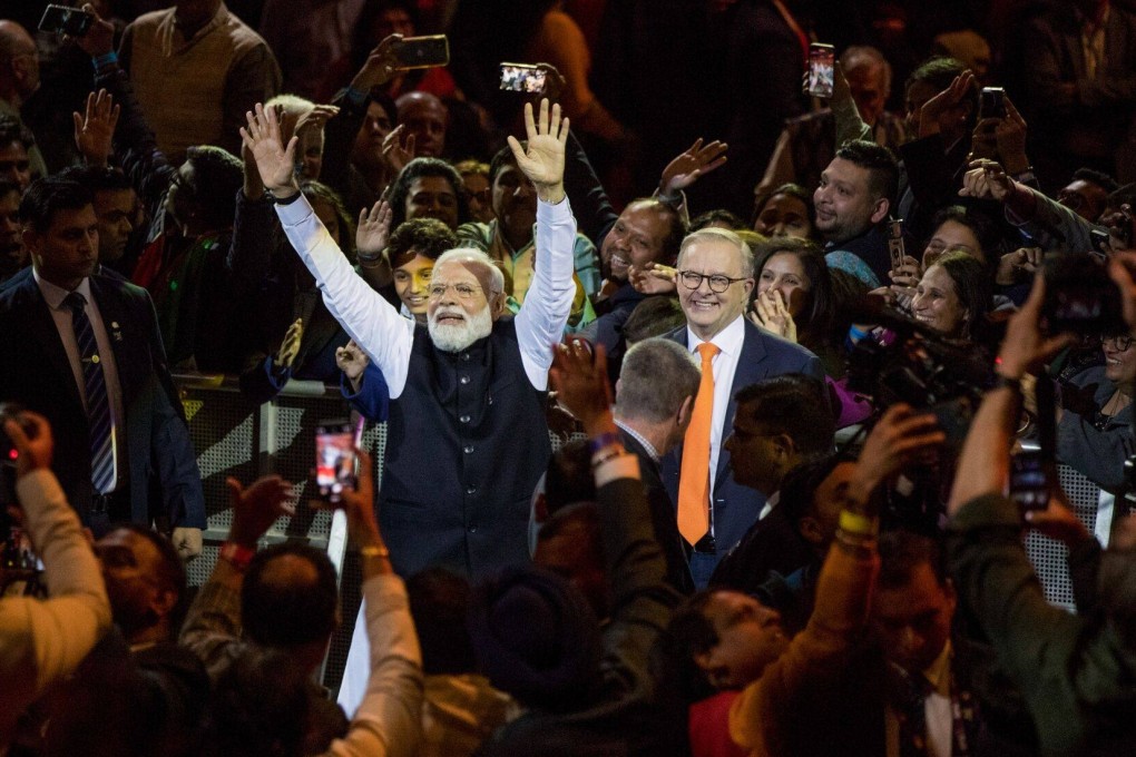 Indian PM Narendra Modi arrives with his Australian counterpart Anthony Albanese at the Qudos Bank Arena. Photo: Bloomberg