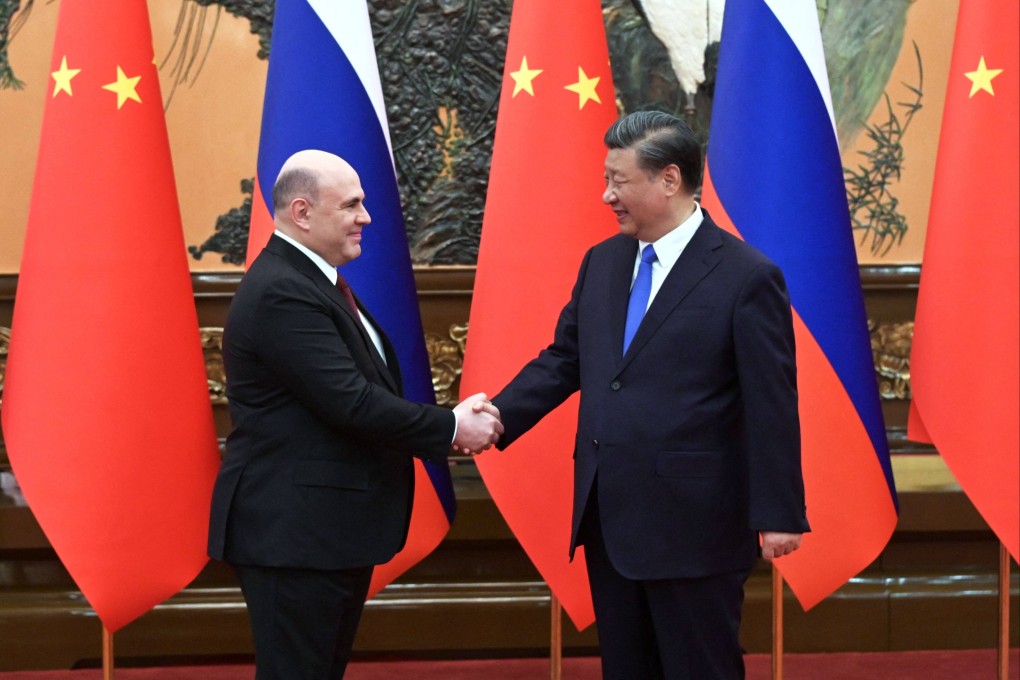 Russian Prime Minister Mikhail Mishustin meets Chinese President Xi Jinping in Beijing on Wednesday. Photo: AFP