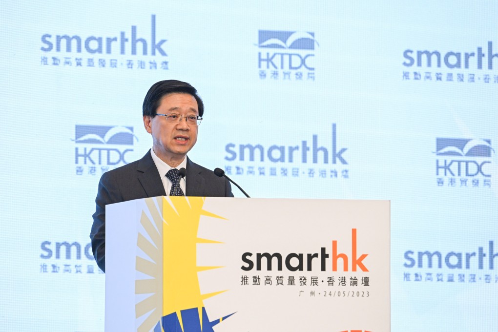Hong Kong’s Chief Executive John Lee addresses the opening ceremony of the Hong Kong-Guangdong Cooperation Week and the SmartHK forum in Guangzhou on Wednesday. Photo: Handout
